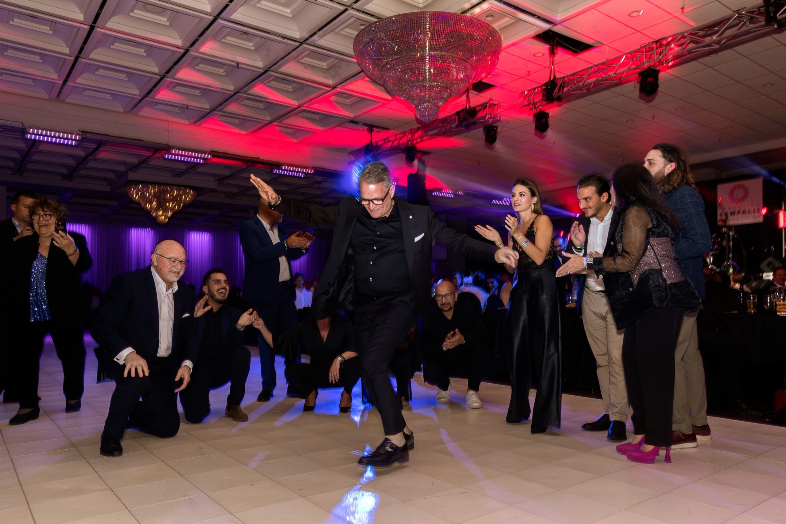 event photographer in laval and montreal dancefloor with guests dancing at private event